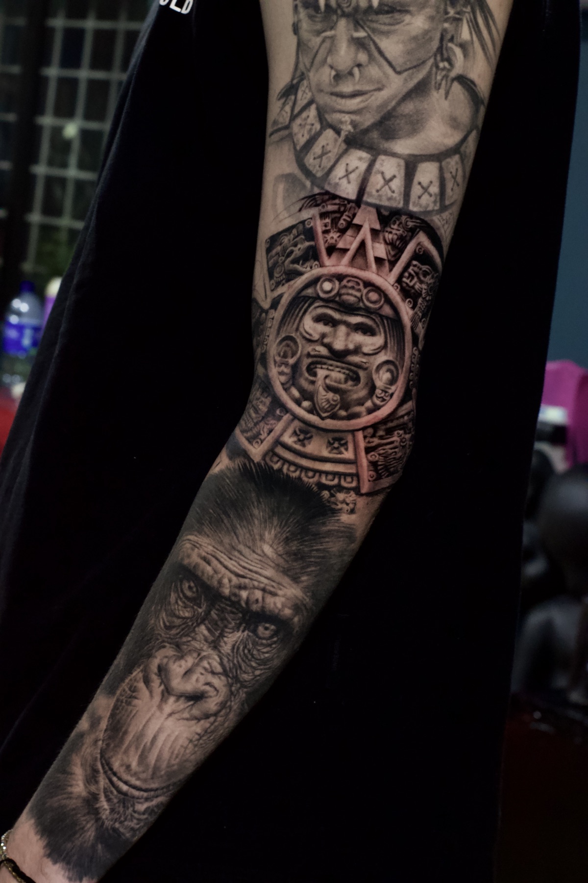 Black and grey full sleeve with Mayan motifs and primate by Mike Villamizar